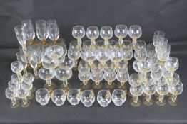 A large quantity of matching amber stemm