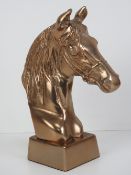 A contemporary copper coloured bust of a