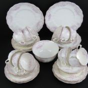 Twelve Allertons porcelain trios togethe