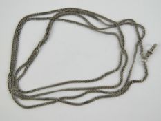 A long white metal guard chain having cl