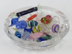 A glass bowl containing a large quantity
