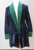 Turnbull & Asser St James; a velvet gentleman's smoking jacket in green and navy,
