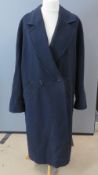 A navy blue wool blend 1980s men's coat, label removed.