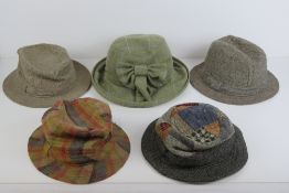 Four 100% new virgin Irish wool tweed hats.