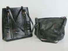 Suzy Smith; Two vintage ladies handbags, one in black leather measuring approx 11