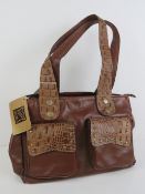 A brown leather and 'crocodile skin' ladies handbag by Anandra. Approx 9