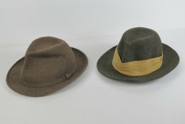 A wool trilby by Lock & Co size 7 1/4, together with another trilby in green wool.