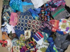 A large quantity of ladies scarves and pashminas. Approx 57 items. Together with scarf hanger.