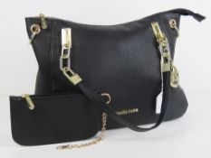 Michael Kors; black leather handbag having purse within, a/f to zip seam of internal pocket.
