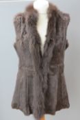 A vintage fur gilet. Approx measurements; 40