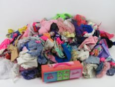 An extensive quantity of vintage Barbie and Sindy clothing, some items a/f.