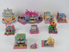 Polly Pocket; c1990s five houses having pavements to front, one having various sections inc stables,