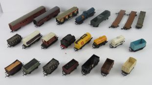 A quantity of Triang Hornby model railway goods carriages inc R117 Shell tanker and two other Shell