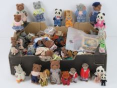 An extensive collection of Sylvanian Family figures inc boars, meercats, foxes, ducks, owls, otters,