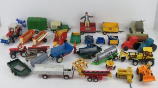 A quantity of Britain's metal farm vehicles and machinery inc trailers, Land Rover, tractor, etc,