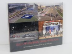 Gulf Air Bahrain Grand Prix 2015, hardback book of event photographs. In plastic wrap.