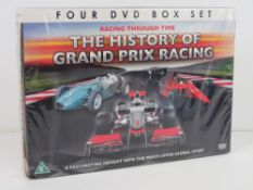 DVD box set Racing Through Time 'The History of Grand Prix Racing', in plastic wrap.
