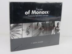 Faces of Monaco Photos by Sebastien Darrasse. Published 2004. Hardback book. In plastic wrap.