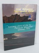 The Success Story of the 1st Petronas Malaysian Grand Prix. Hardback book. In plastic wrap.