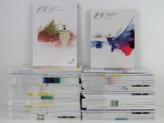A large quantity of assorted Formula 1 race programmes for 2015.