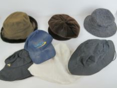 A quantity of assorted hats, various makers inc John Partridge, Barbour and Olney. Seven items.