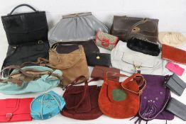 A quantity of assorted vintage and contemporary ladies handbags including 1970s suede examples,