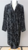 A ladies 3/4 length faux fur coat by Windsmoor, UK size 14.