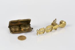 Edward VII sovereign dated 1909, a leather sovereign case and a cased set of sovereign scales (3)