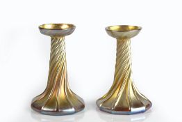 Louis Comfort Tiffany (1848-1933) pair of glass candlesticks gold iridescent finish, twisted form