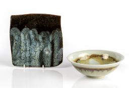 Two pieces of studio pottery both indistinctly marked, one celadon glazed bowl 15cm across and an