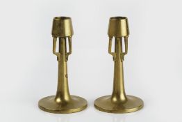 Pair of Viennese Secessionist style candlesticks brass candlesticks, unmarked 13.5cm high (2)