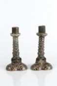 Robert Wallace Martin at Martin Brothers pair of candlesticks, deep blue brown glaze, with mythical,