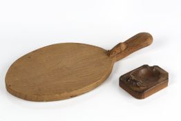 Robert Thompson of Kilburn (1876-1955) Mouseman cheese board, oak, carved mouse signature to