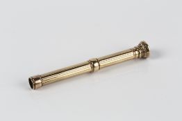 Victorian propelling pencil unmarked yellow metal, with inset seal of an owl into the top,
