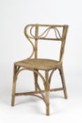 Dryads wicker chair, with plaque to the reverse 76cm high
