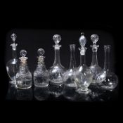 Pair of cut glass decanters Regency period, 21cm high and six other decanters