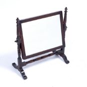Mahogany swing toilet mirror 19th Century, 37cm across, 41cm high Provenance: Long Court,