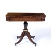 Rosewood and inlaid card table 19th Century, with fold-over swivel top on parcel gilt column, 95cm