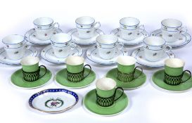 Set of Shelley teacups and saucers with green glaze with silver holders, a set of eight Richard