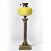 Victorian oil lamp base with glass reservoir on brass Corinthian column, 56cm high Provenance: