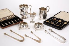 Collection of silver consisting of two cased sets of silver teaspoons, three pairs of silver sugar