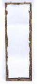 Early 20th Century French style overmantel mirror with gilt painted scrolling frame, 127cm x 40cm