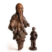 Root carving Chinese, 19th Century carved with a bearded sage's head above a gnarled body, 40cm