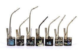 Collection of seven cloisonne and paktong water pipes Chinese, circa 1900 variously decorated.