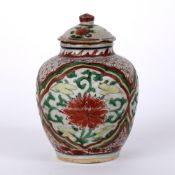 Polychrome jar and cover Chinese, Ming period painted with iron-red lotus, each in a panel, 15cm
