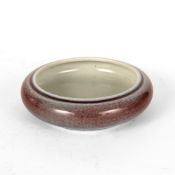 Jun type brush washer Chinese, 18th Century with a red/blue glaze to the body, on a short foot base,