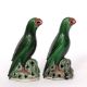 Pair of porcelain models of green glazed parrots Chinese, 19th Century Kangxi-style with black eyes, - Image 3 of 5