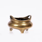 Bronze censer Chinese, 18th/19th Century with raised handles on three feet, with Xuande seal mark to
