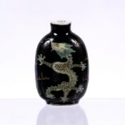 Famille noire porcelain snuff bottle Chinese, 19th Century Daoguang with green scaly dragons to both