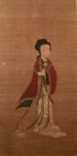 Mounted silk scroll Chinese, 18th/19th Century depicting a female figure holding a lotus in her left